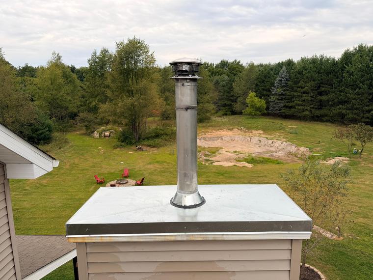 A new galvanized chase cover fitted to the chase